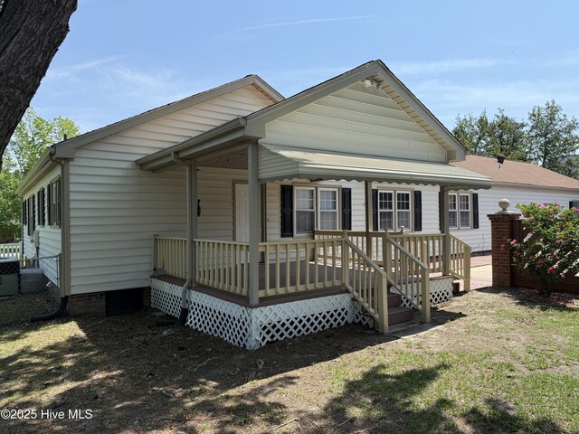 120 Ridgecrest Dr, Mount Olive, NC 28365 - rear view of property featuring a porch