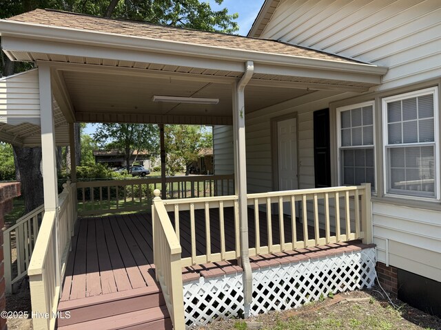 120 Ridgecrest Dr, Mount Olive, NC 28365 - wooden deck featuring a porch
