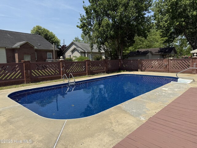 120 Ridgecrest Dr, Mount Olive, NC 28365 - view of swimming pool with a fenced backyard, a fenced in pool, and a deck