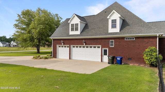106 Cliffwell Dr, Goldsboro, NC 27530 - view of home's exterior with brick siding, a yard, a shingled roof, and driveway