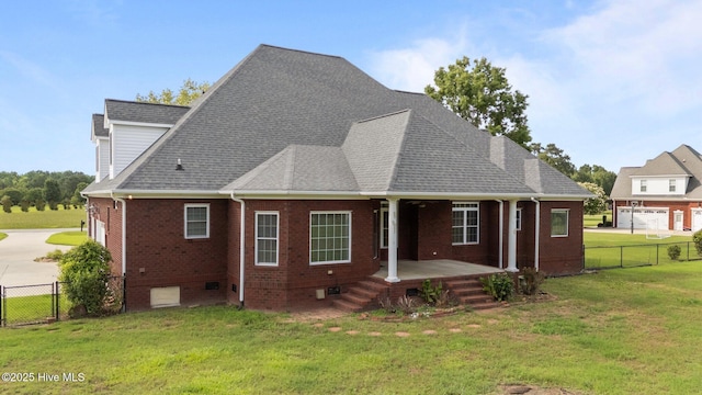 106 Cliffwell Dr, Goldsboro, NC 27530 - rear view of property with brick siding, a porch, crawl space, and roof with shingles