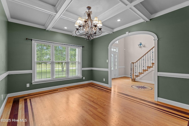 106 Cliffwell Dr, Goldsboro, NC 27530 - unfurnished room featuring wood finished floors, arched walkways, coffered ceiling, beamed ceiling, and baseboards