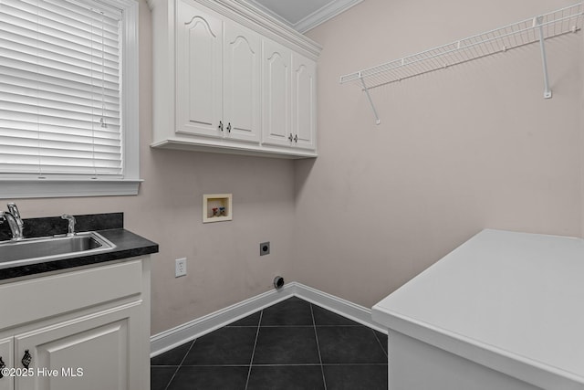 106 Cliffwell Dr, Goldsboro, NC 27530 - washroom featuring baseboards, electric dryer hookup, hookup for a washing machine, dark tile patterned floors, and crown molding