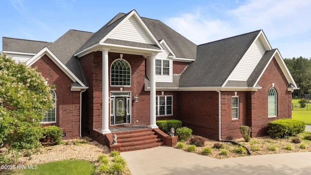 106 Cliffwell Dr, Goldsboro, NC 27530 - view of front facade with brick siding and roof with shingles