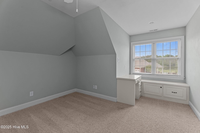 106 Cliffwell Dr, Goldsboro, NC 27530 - additional living space featuring light carpet, baseboards, lofted ceiling, and ceiling fan