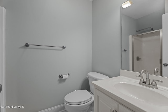 106 Cliffwell Dr, Goldsboro, NC 27530 - bathroom with a shower with shower door, vanity, and toilet