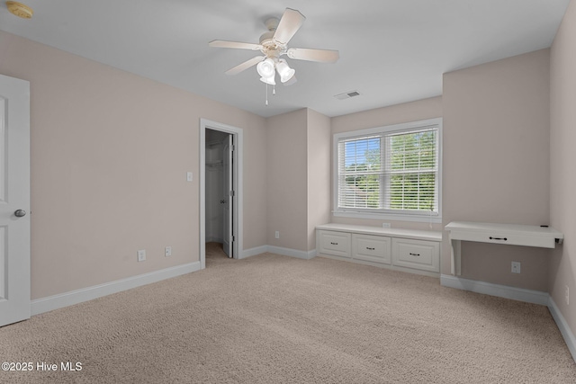 106 Cliffwell Dr, Goldsboro, NC 27530 - unfurnished bedroom featuring light carpet, baseboards, and ceiling fan