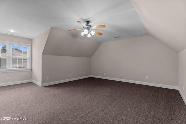 106 Cliffwell Dr, Goldsboro, NC 27530 - additional living space featuring carpet flooring, lofted ceiling, a ceiling fan, and baseboards