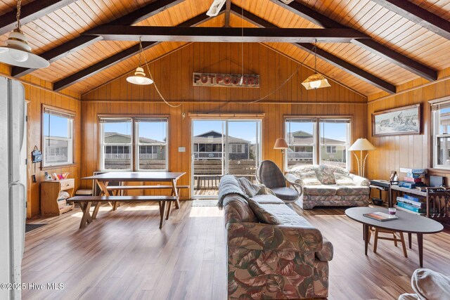 421 35th St, Sunset Beach, NC 28468 - living area featuring hardwood / wood-style floors, wood walls, and wood ceiling