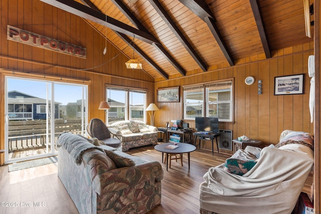 421 35th St, Sunset Beach, NC 28468 - living area with wooden walls, wood-type flooring, and wooden ceiling