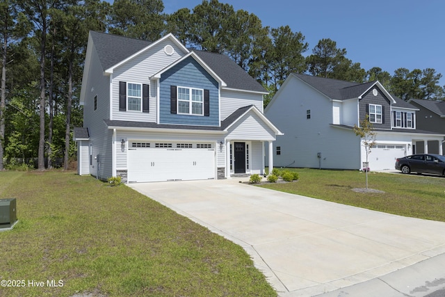 230 Lookout Ln, Sneads Ferry, NC 28460 - view of front of house with driveway, an attached garage, stone siding, and a front yard