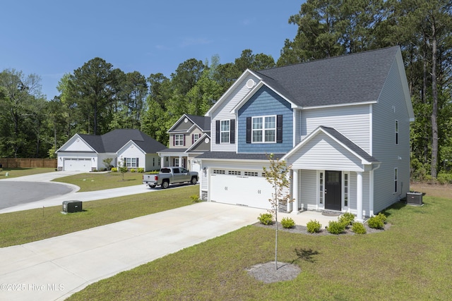 230 Lookout Ln, Sneads Ferry, NC 28460 - view of front of house with driveway, a shingled roof, a front yard, and an attached garage