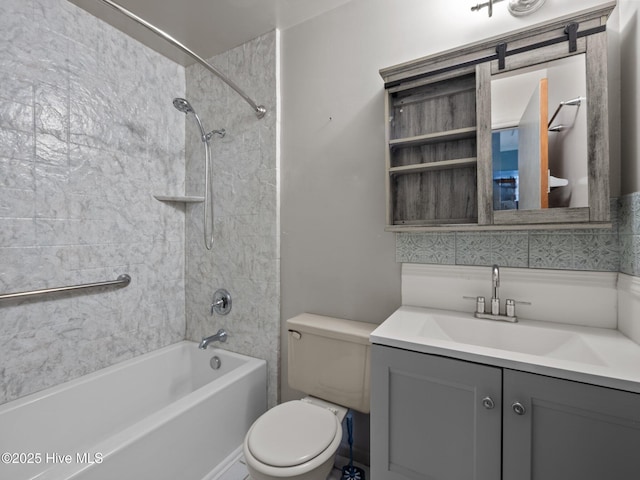 bathroom with vanity, washtub / shower combination, and toilet