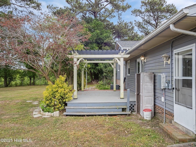 view of yard with a pergola and a wooden deck