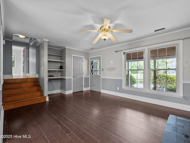 unfurnished living room featuring wood-type flooring, a ceiling fan, baseboards, and ornamental molding