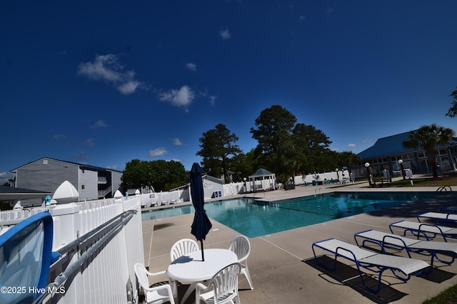 5017 Bucco Reef Rd, New Bern, NC 28560 - community pool with a patio, fence, and a gazebo