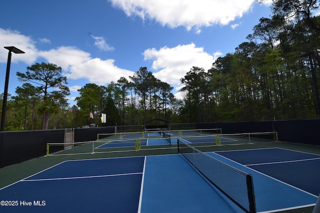 5017 Bucco Reef Rd, New Bern, NC 28560 - view of tennis court featuring community basketball court and fence