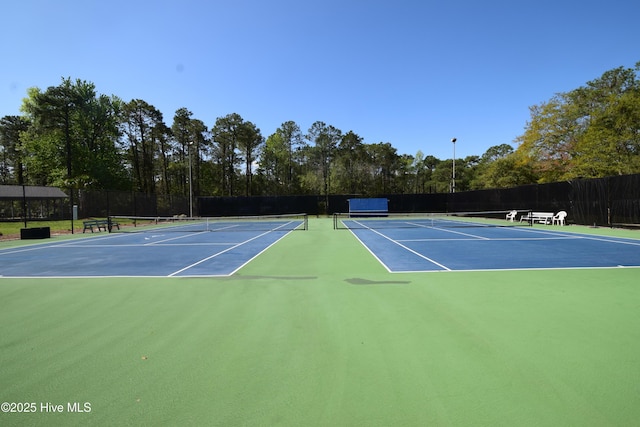 5017 Bucco Reef Rd, New Bern, NC 28560 - view of tennis court featuring community basketball court and fence