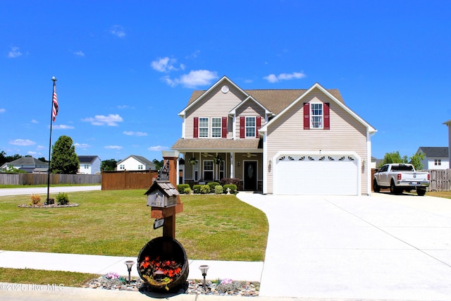 view of front of house featuring a front lawn, fence, covered porch, concrete driveway, and an attached garage