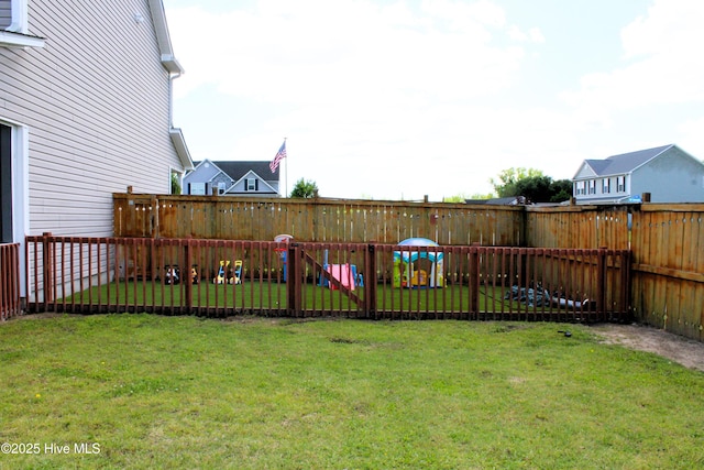 view of yard featuring a fenced backyard