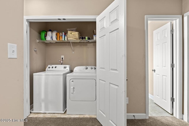 248 Seville St, Jacksonville, NC 28546 - clothes washing area featuring independent washer and dryer, baseboards, light tile patterned floors, and light carpet