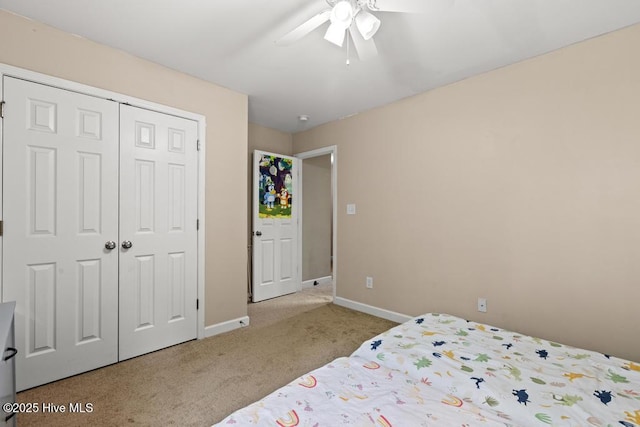 248 Seville St, Jacksonville, NC 28546 - carpeted bedroom with baseboards, a closet, and a ceiling fan