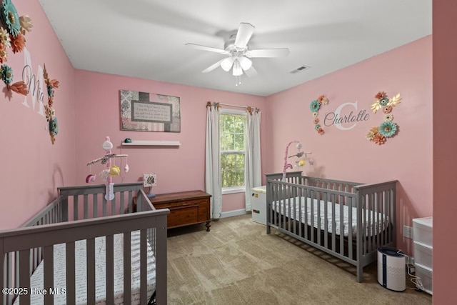 248 Seville St, Jacksonville, NC 28546 - carpeted bedroom featuring a nursery area, a ceiling fan, and baseboards