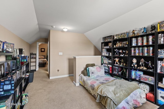 248 Seville St, Jacksonville, NC 28546 - carpeted bedroom with vaulted ceiling and baseboards