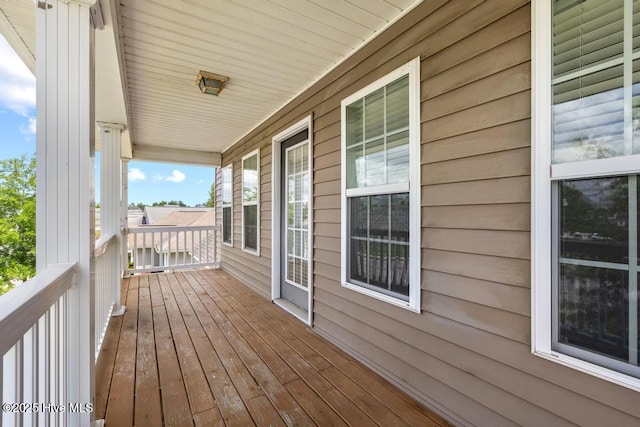 248 Seville St, Jacksonville, NC 28546 - wooden terrace featuring covered porch