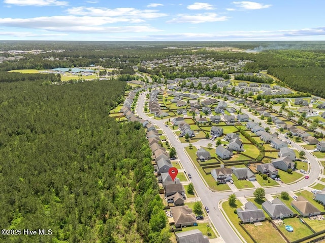 248 Seville St, Jacksonville, NC 28546 - aerial view of property and surrounding area with a forest and nearby suburban area
