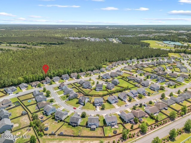 248 Seville St, Jacksonville, NC 28546 - view of property location with a forest and nearby suburban area