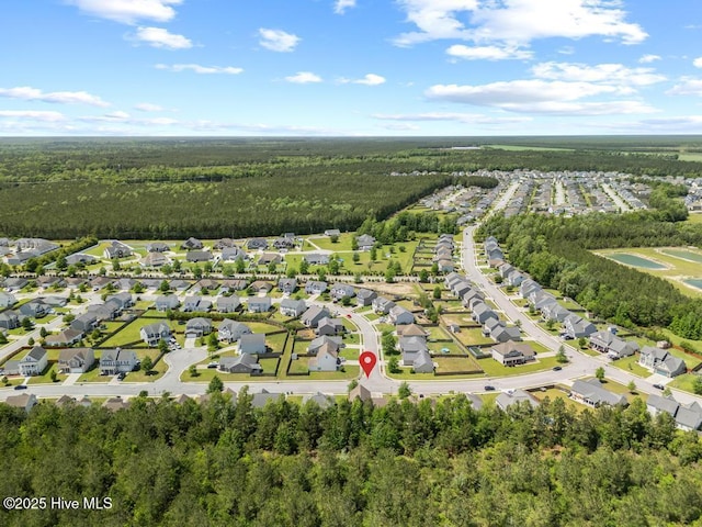 248 Seville St, Jacksonville, NC 28546 - aerial overview of property's location with a forest and nearby suburban area