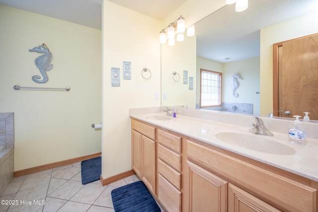 full bath with double vanity, a sink, and a garden tub