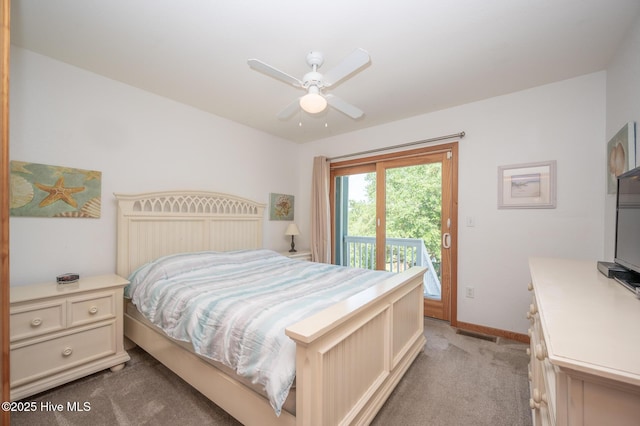 bedroom with a ceiling fan, baseboards, access to exterior, and light carpet