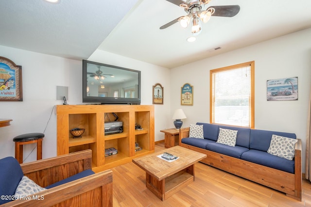 living area with recessed lighting, ceiling fan, visible vents, and wood finished floors