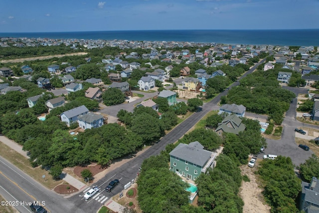 aerial view with a residential view and a water view