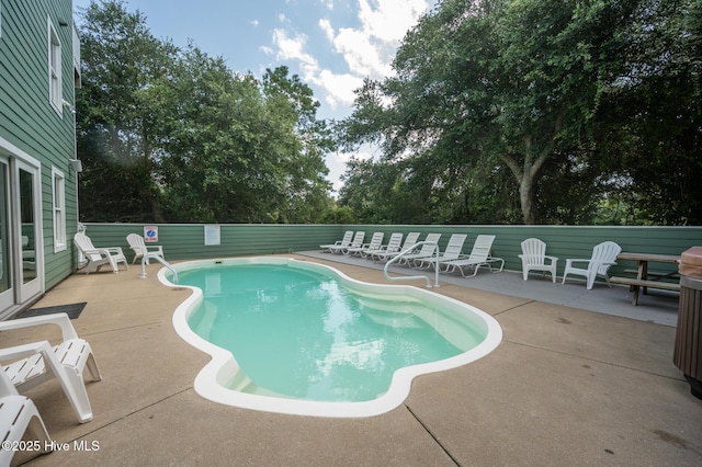 pool featuring a patio area