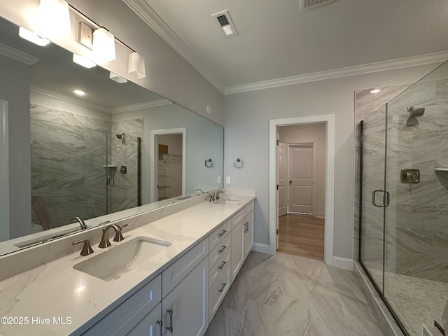 3157 Painted Turtle Loop Unit 37, Wilmington, NC 28409 - bathroom with double vanity, a stall shower, a spacious closet, marble finish floors, and crown molding