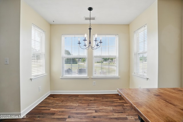 101 Whitetail Ct, South Mills, NC 27976 - unfurnished dining area featuring visible vents, dark wood finished floors, plenty of natural light, and baseboards