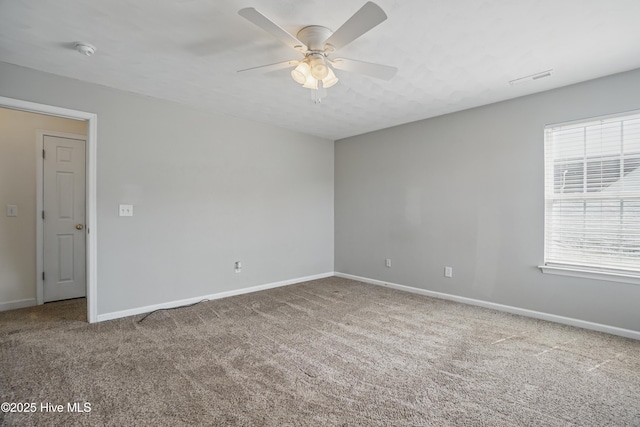 101 Whitetail Ct, South Mills, NC 27976 - spare room featuring baseboards, ceiling fan, and carpet
