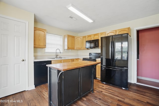 101 Whitetail Ct, South Mills, NC 27976 - kitchen with visible vents, light brown cabinetry, a sink, black appliances, and dark wood-style floors