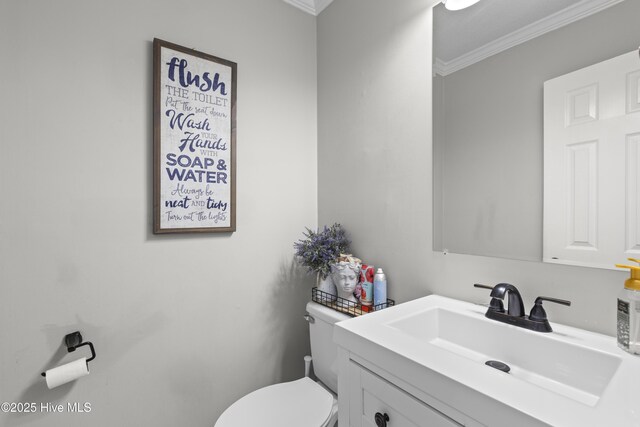 803 Oakwood Ave, Jacksonville, NC 28546 - half bath with crown molding, toilet, and vanity