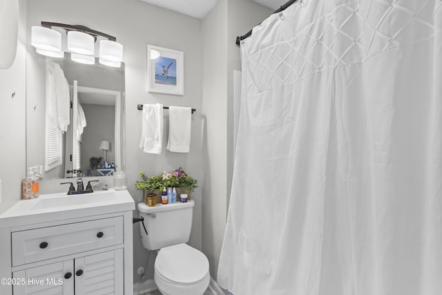 803 Oakwood Ave, Jacksonville, NC 28546 - bathroom with toilet and vanity