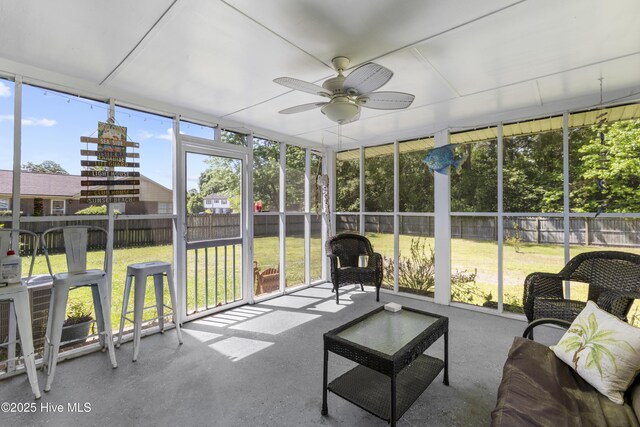 803 Oakwood Ave, Jacksonville, NC 28546 - sunroom featuring a ceiling fan and a wealth of natural light