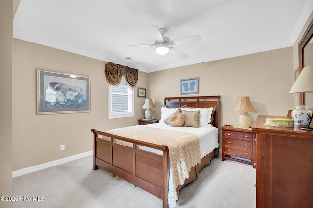 bedroom featuring light colored carpet, crown molding, baseboards, and ceiling fan