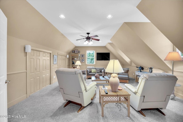 living area featuring carpet, vaulted ceiling, ceiling fan, and recessed lighting