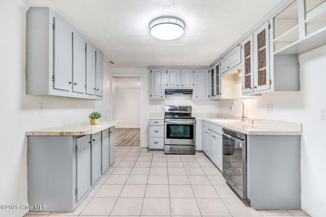 3210 Central Heights Rd, Goldsboro, NC 27534 - kitchen featuring light countertops, a sink, gray cabinets, and stainless steel appliances