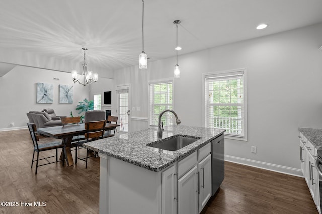 224 Pristine Ct, West End, NC 27376 - kitchen featuring a sink, open floor plan, dishwasher, a chandelier, and dark wood finished floors