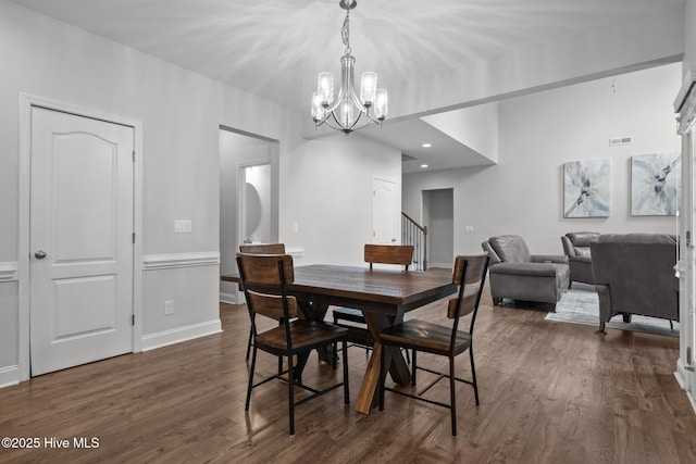 224 Pristine Ct, West End, NC 27376 - dining area with dark wood-style flooring, a chandelier, stairway, recessed lighting, and baseboards