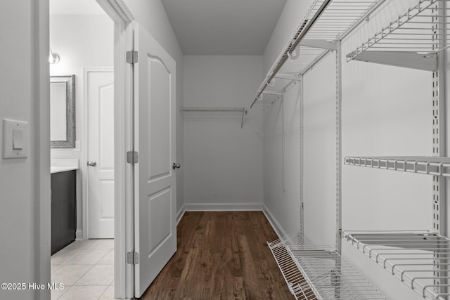 224 Pristine Ct, West End, NC 27376 - spacious closet featuring wood finished floors